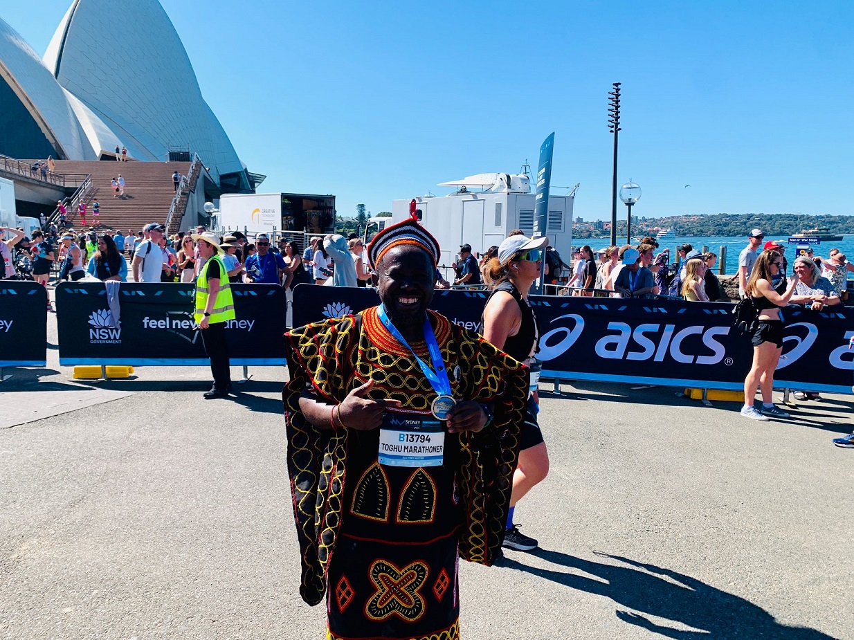 Inspirational: Afowiri reveals how Cameroonian Internally Displaced Persons (IDPs) made his Sydney Marathon Toghu Outfit