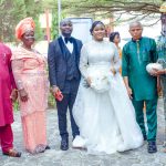 Couple with their parents. Right: Brides parents: Ven. Ngozi and Faith Ofoegbulam . Left: Pastor Chima and Elder Francisca Mbisike.